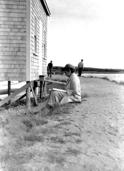 Dorothy Loeb working on the shore
